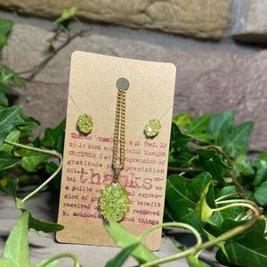 A beautiful green olivine earring and necklace set